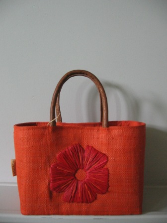 sac &agrave; main fleur orange